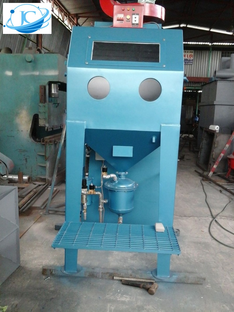 máy phun bi làm sạch thiết bị