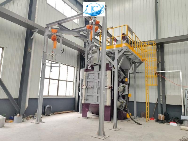 máy phun bi làm sạch vật đúc